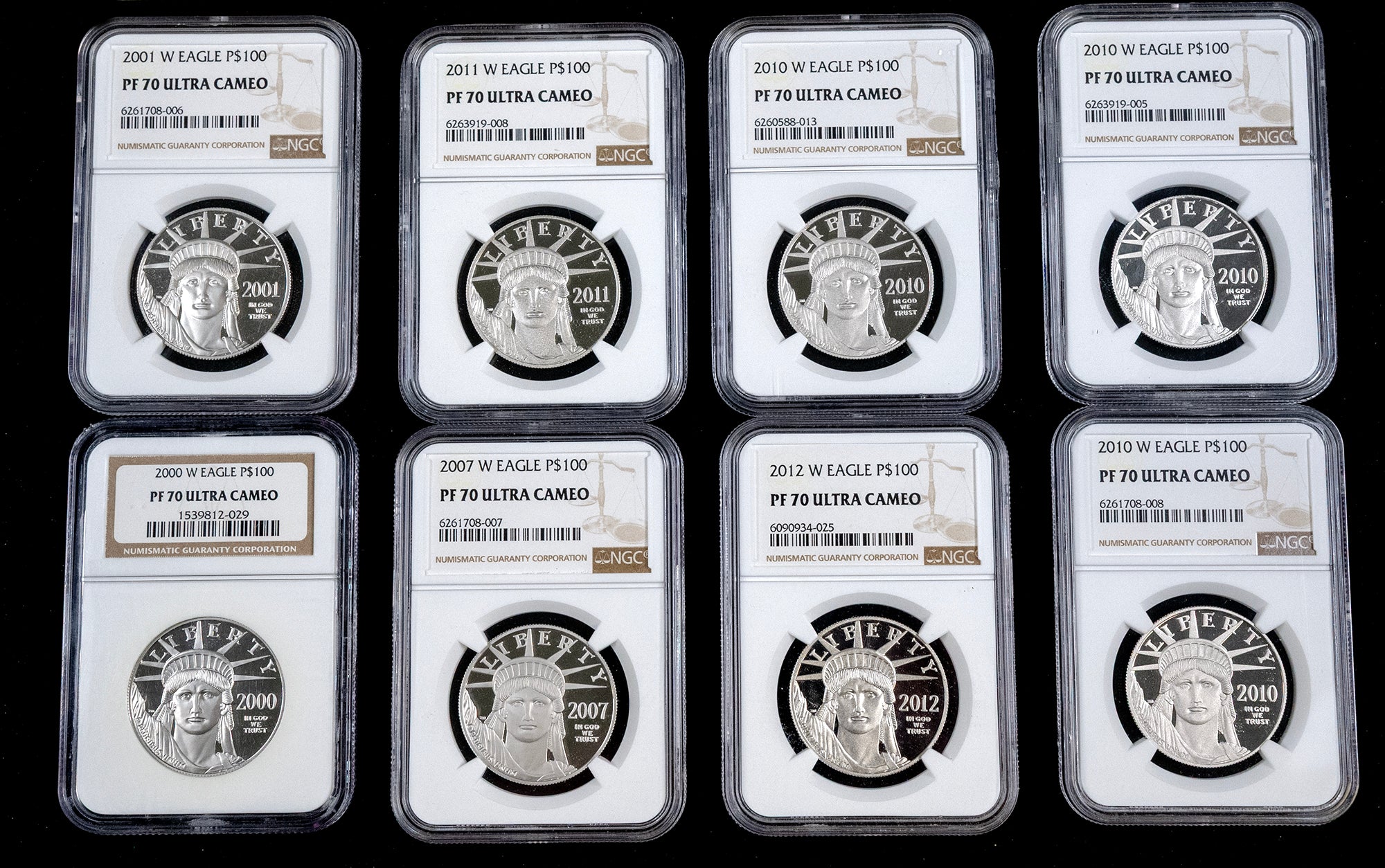 Eight graded silver coins from the United States Eagle Series 75 proof set, each encapsulated in a Professional Coin Grading Service (PCGS) holder against a black background.